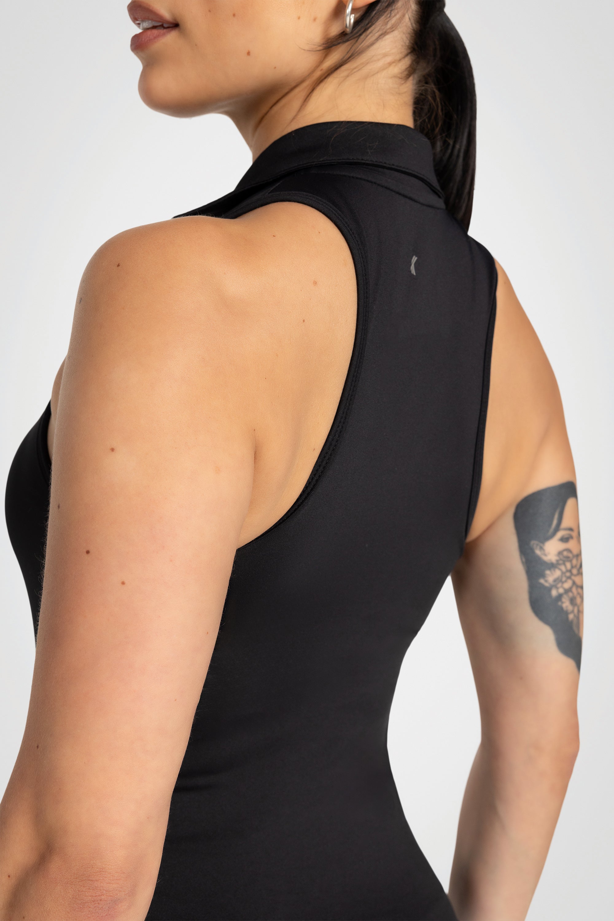 Lila Sleeveless Polo Top